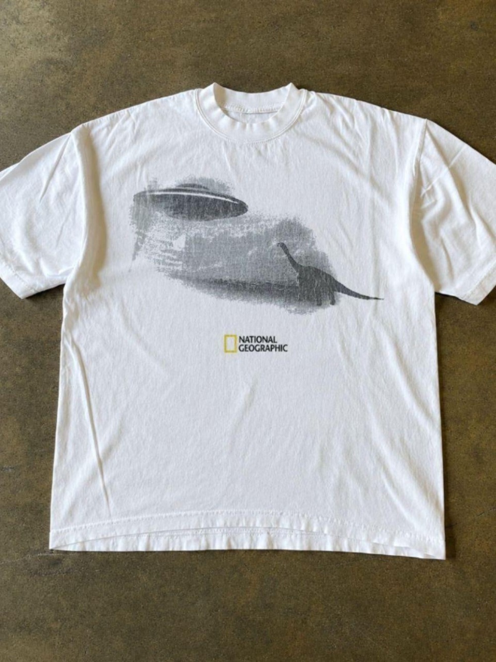 National Geographic White Tee with Gray Dinosaur Graphic